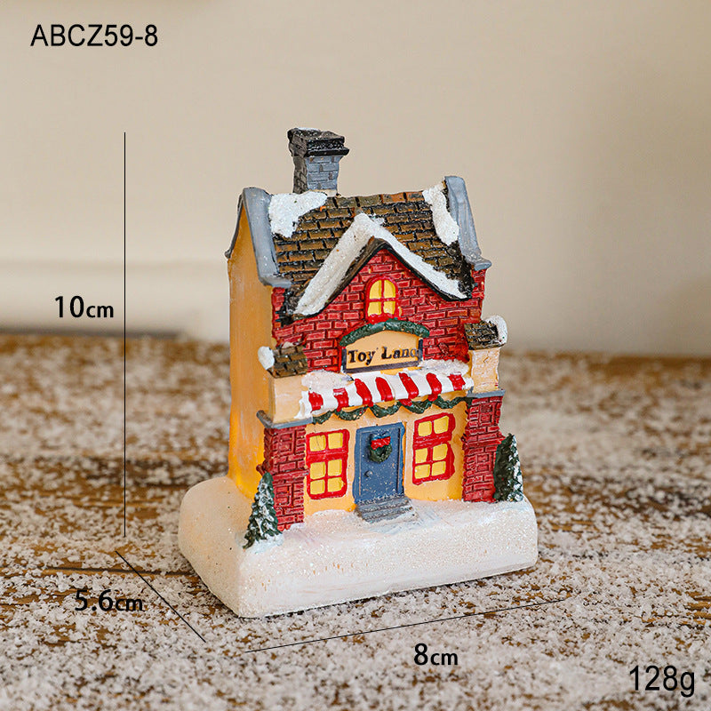 Illuminated Christmas house made of resin