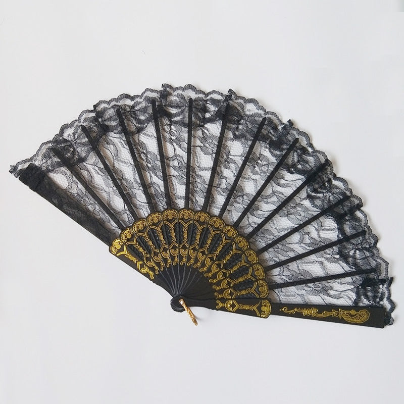 Women's fan made of fine lace with elegant gold embellishment 
Maetiva