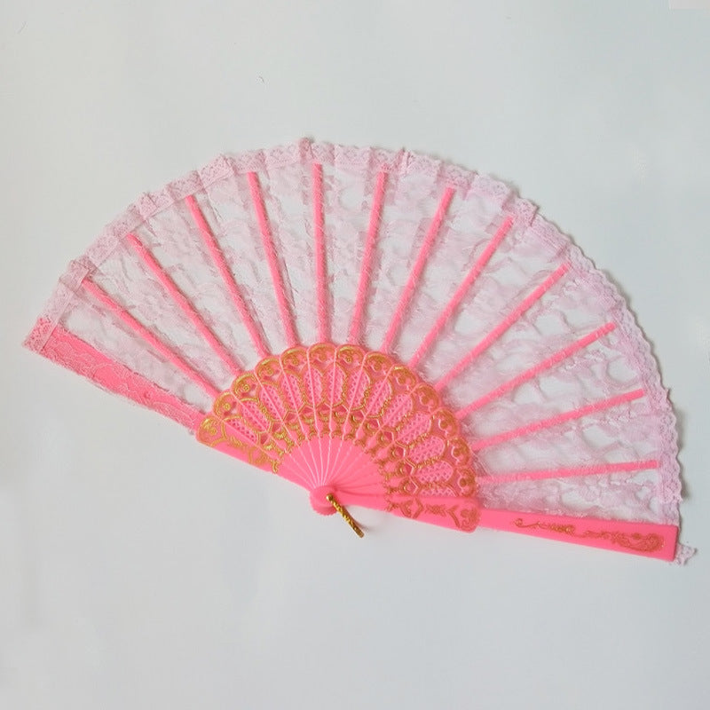 Women's fan made of fine lace with elegant gold embellishment 
Maetiva