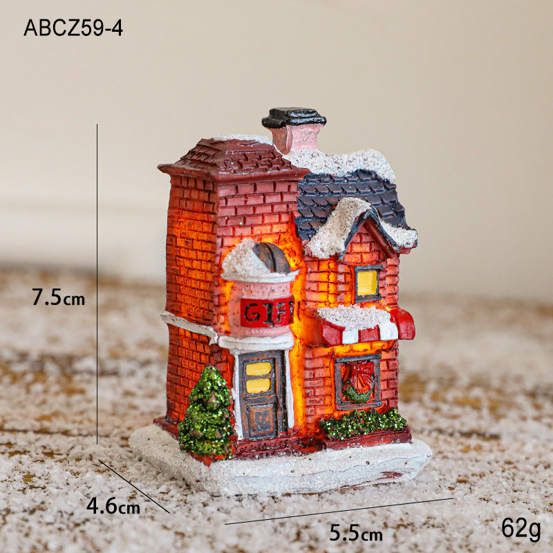Illuminated Christmas house made of resin