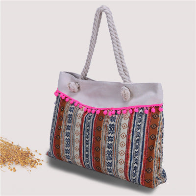 Large beach bag with crocheted embellishments 
Maetiva