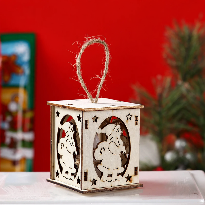 Illuminated wooden house for Christmas decoration