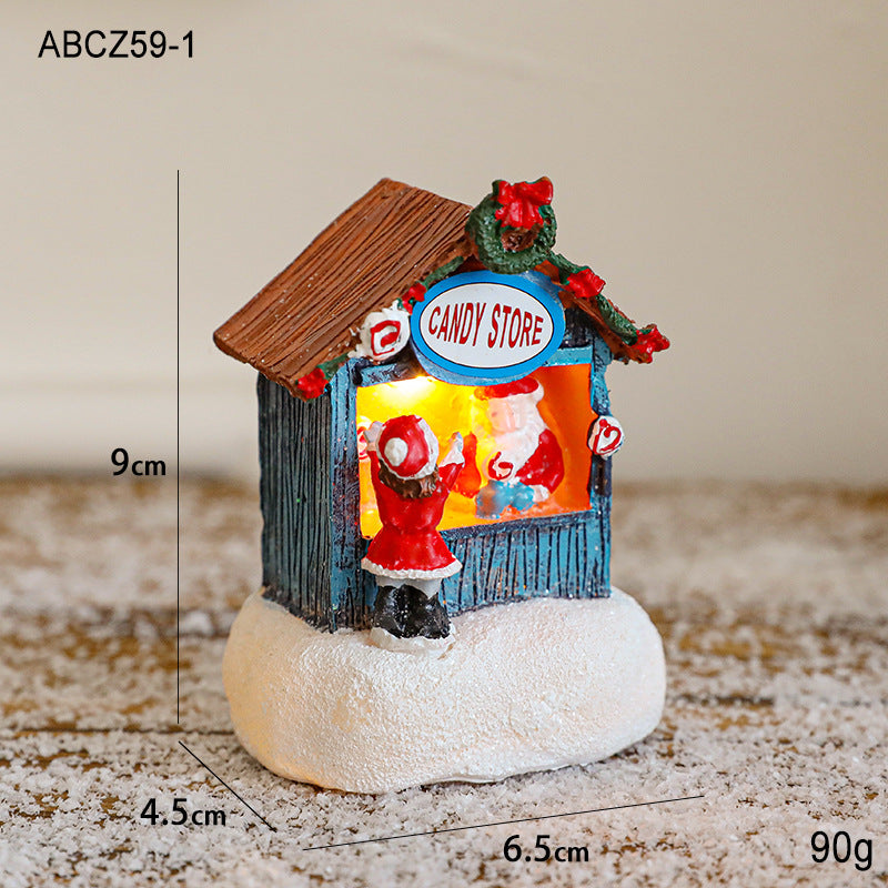 Illuminated Christmas house made of resin