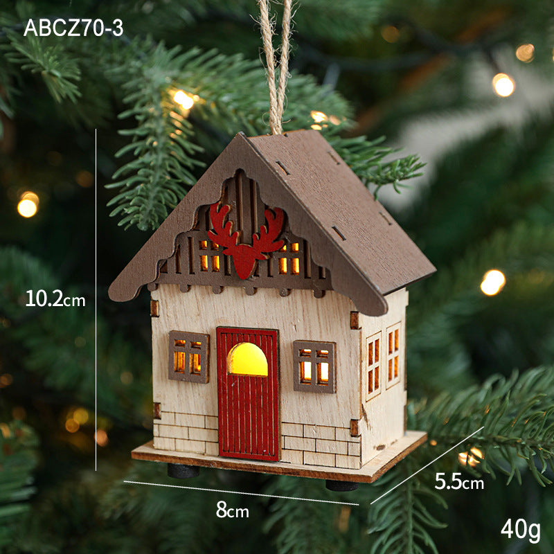 Illuminated wooden house for Christmas decoration