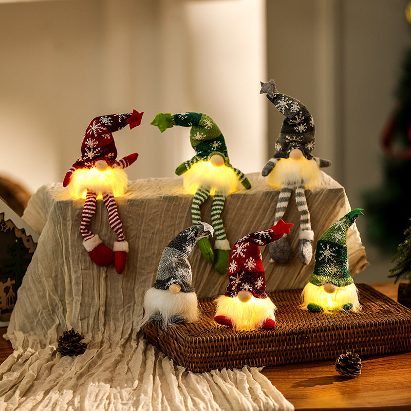 Illuminated gnome figure, sitting, with knit hat