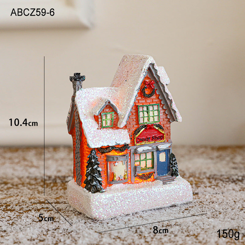 Illuminated Christmas house made of resin