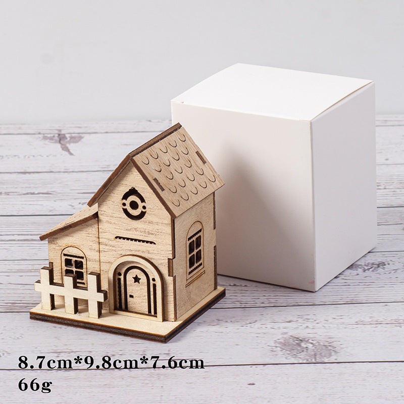 Illuminated wooden house for Christmas decoration