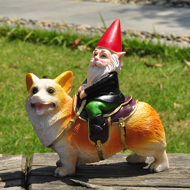 Christmas dwarf on dog, resin figure, 12x7x15 cm