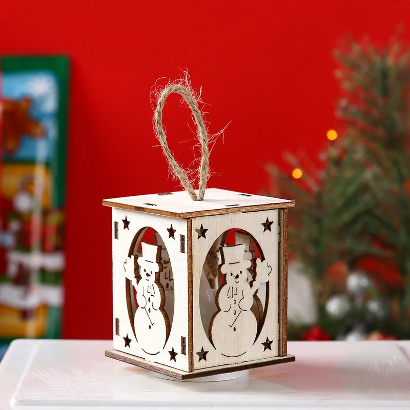 Illuminated wooden house for Christmas decoration