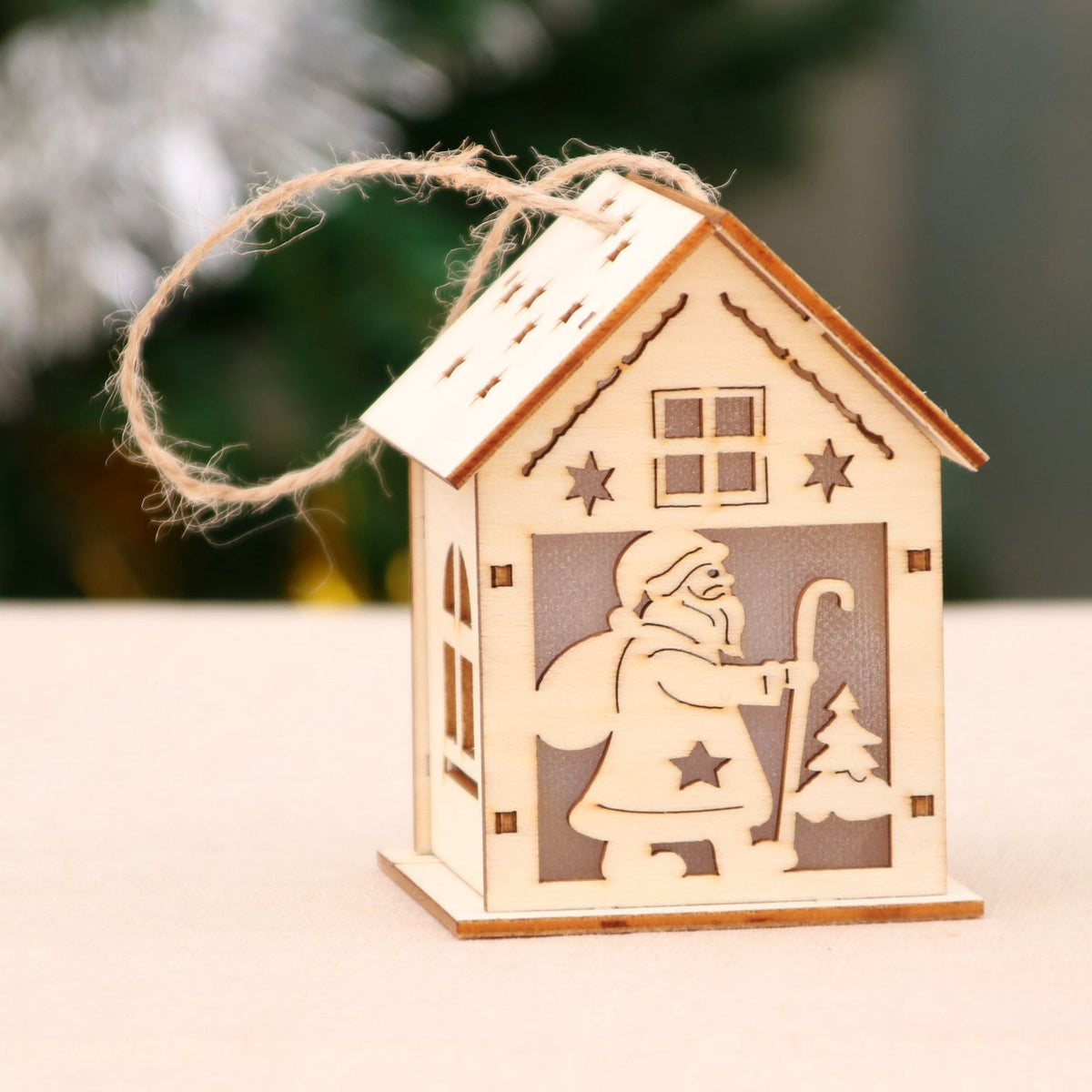 Illuminated wooden Christmas house, decorative
