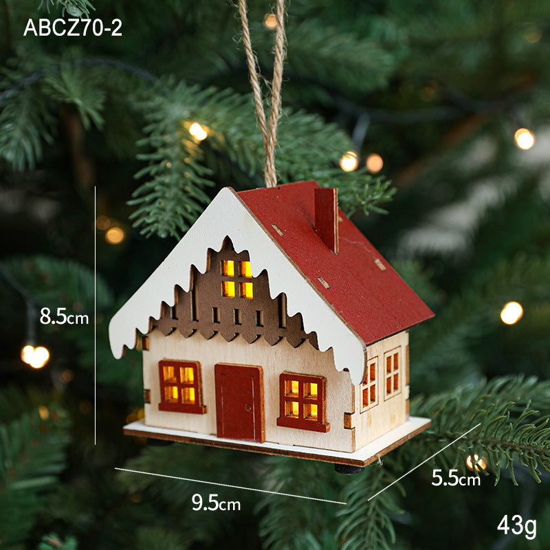 Illuminated wooden house for Christmas decoration