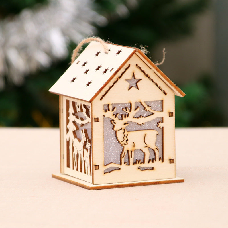 Illuminated wooden Christmas house, decorative