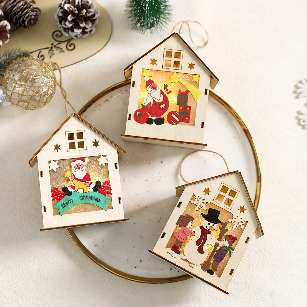 Illuminated wooden house as Christmas decoration