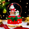 Christmas snow globe with light and music