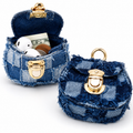 Distressed denim micro crossbody mini purse with gold turn-lock top handle 
Maetiva
