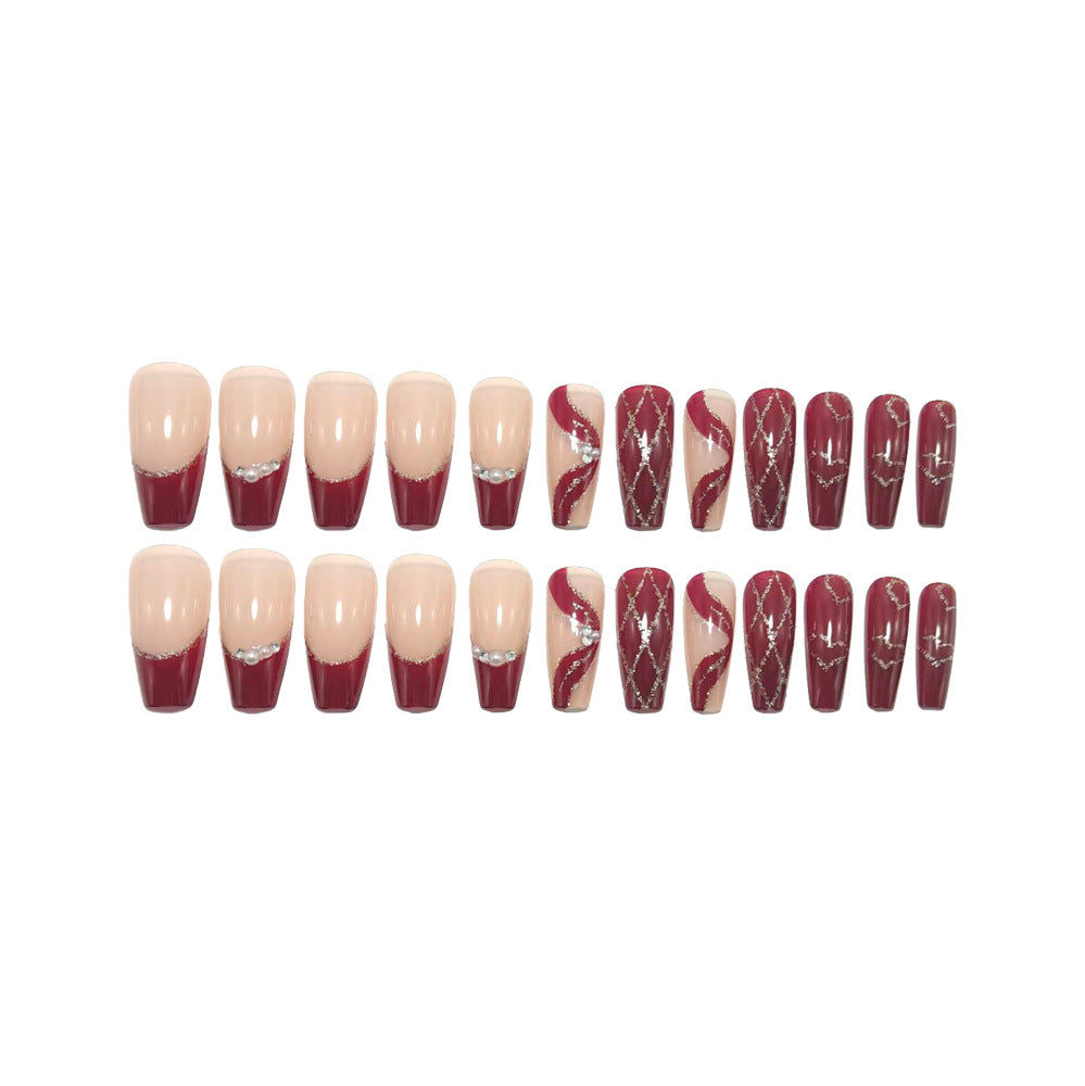 Artificial nails with elegant pearl and glitter decorations 
Maetiva