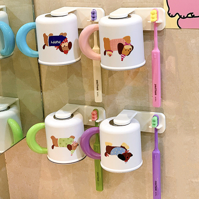 Wall-mounted toothbrush holder with cute dog design 
Maetiva