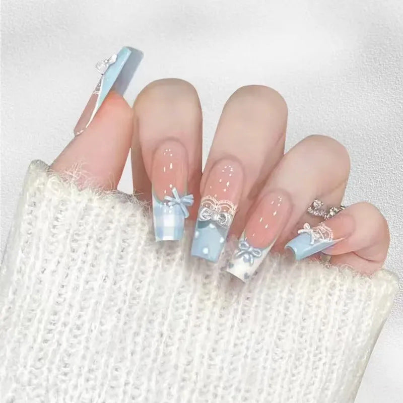 Ombre Stiletto Press-On Nail Art with Gem Accents 
Maetiva