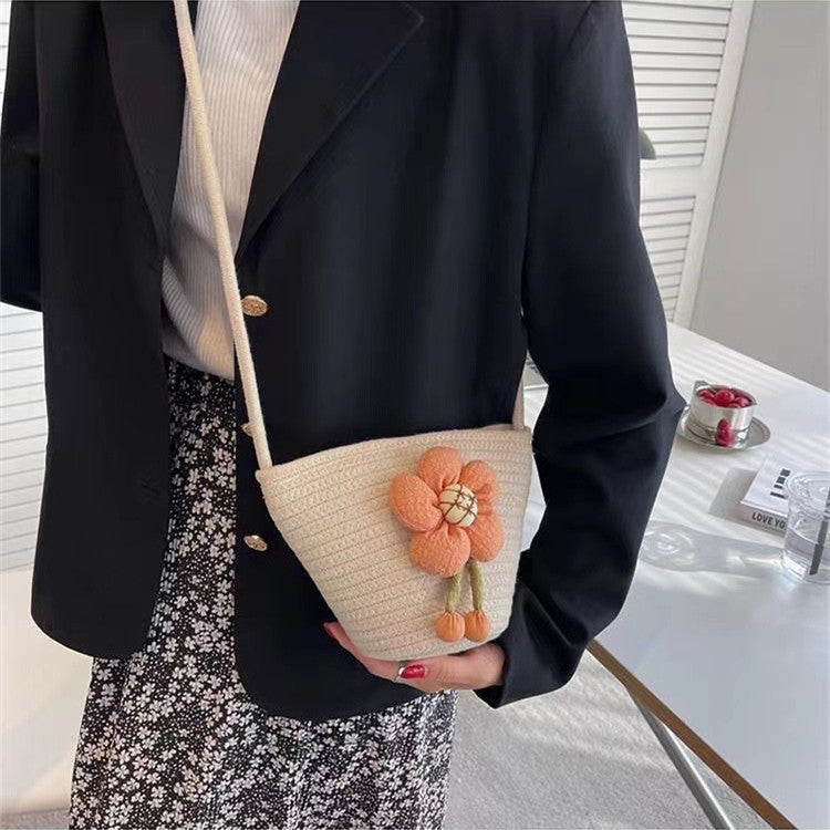 Handcrafted shoulder bag with flower applique 
Maetiva