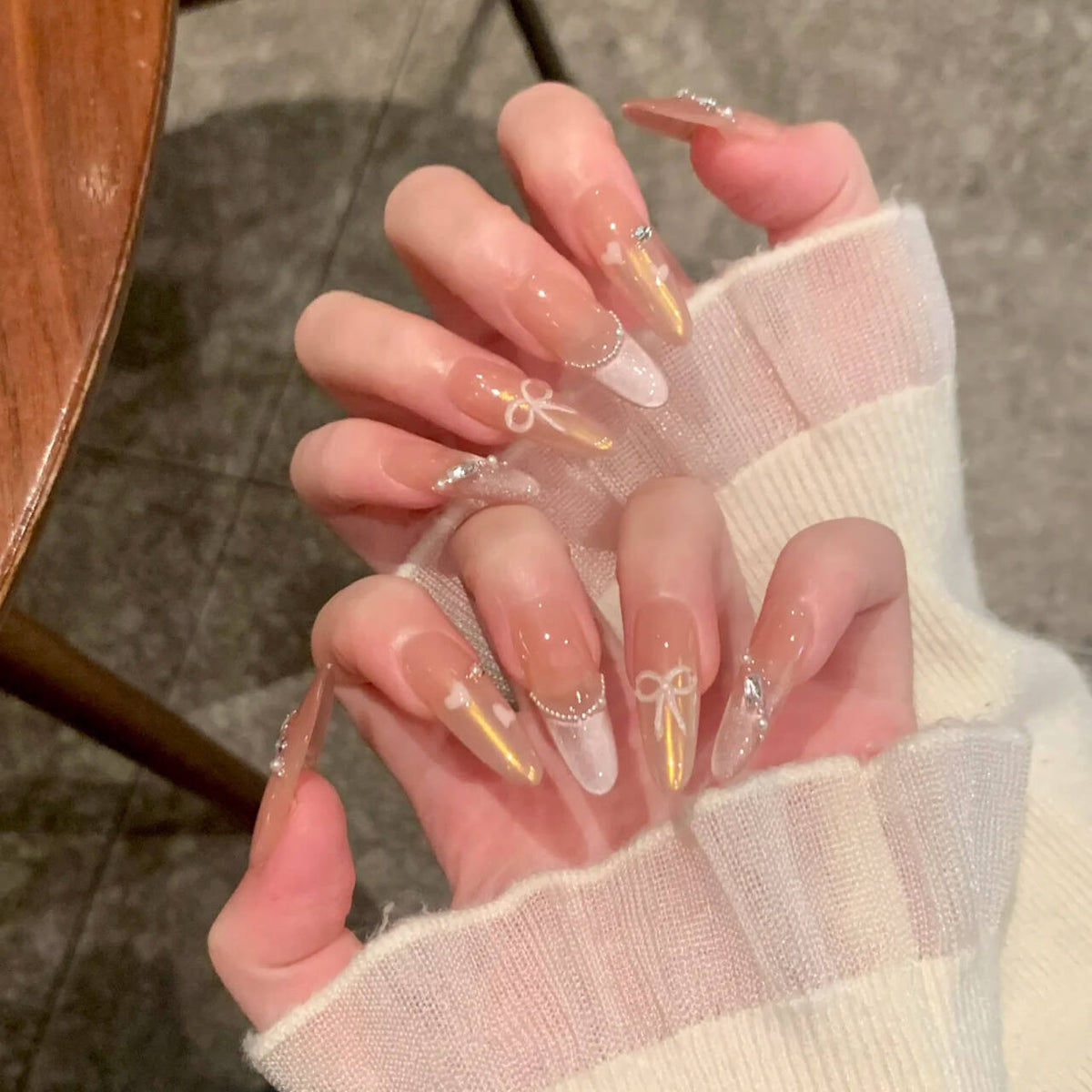 Artistic Nail Design with Decorative Elements 
Maetiva