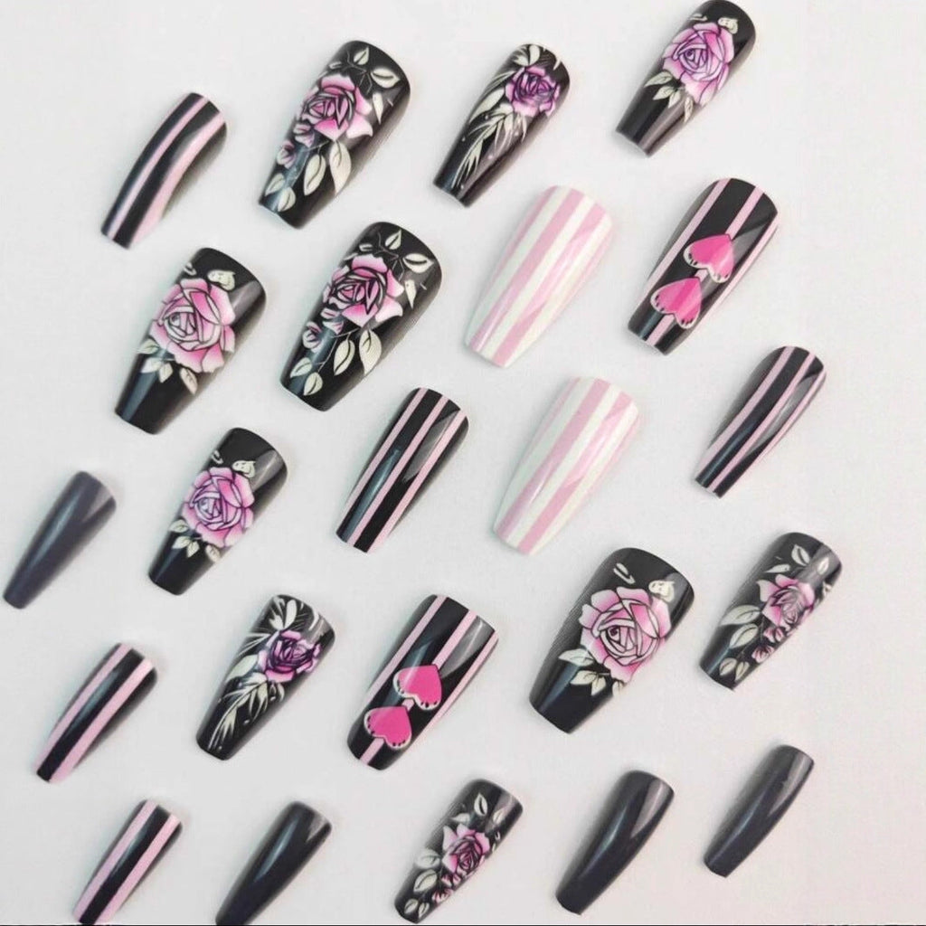 Artificial nail set with romantic rose and heart designs 
Maetiva