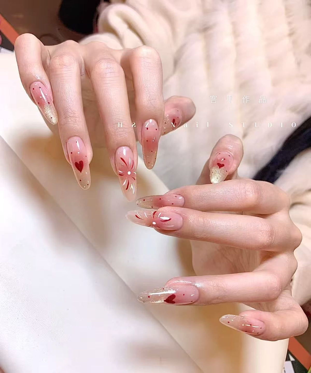 Ombre Stiletto Press-On Nail Art with Gem Accents 
Maetiva