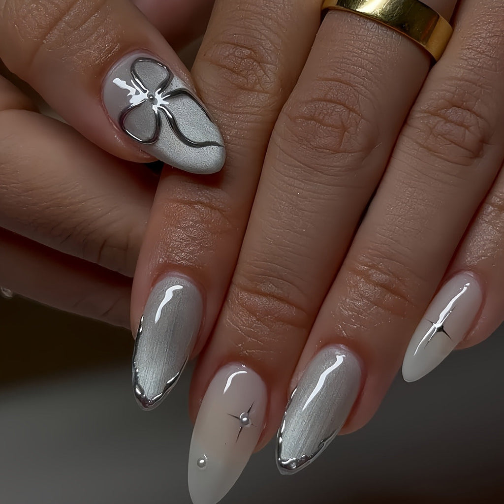 Elegant Press-On Nail Art with Floral Accents 
Maetiva