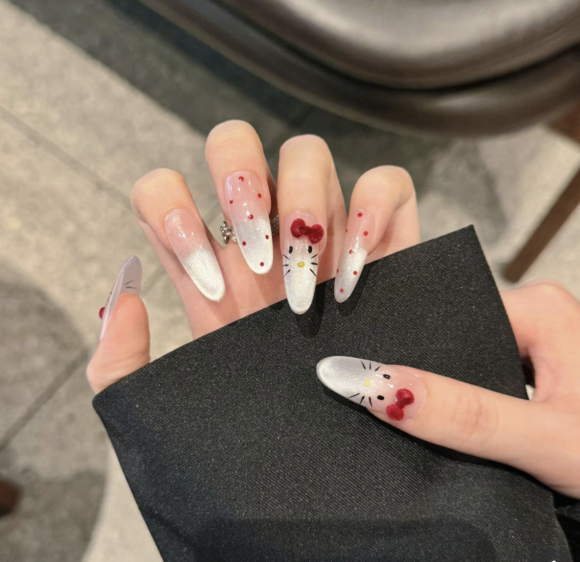 Ombre Stiletto Press-On Nail Art with Gem Accents 
Maetiva