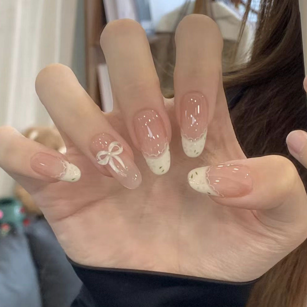 Ombre Stiletto Press-On Nail Art with Gem Accents 
Maetiva