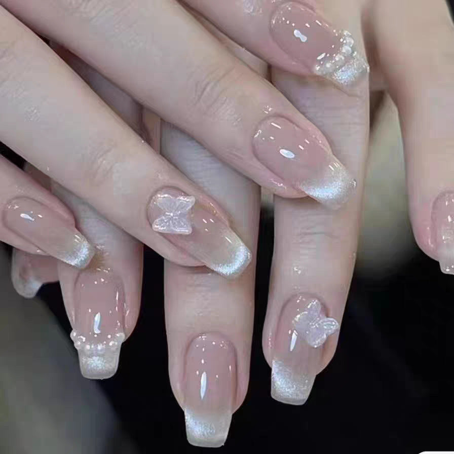 Ombre Stiletto Press-On Nail Art with Gem Accents 
Maetiva