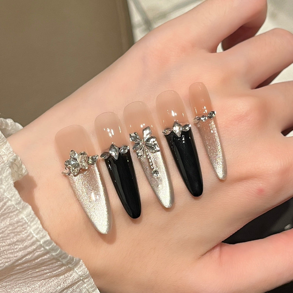 Glamorous Crystal-Studded Stiletto Press-On Nails 
Maetiva