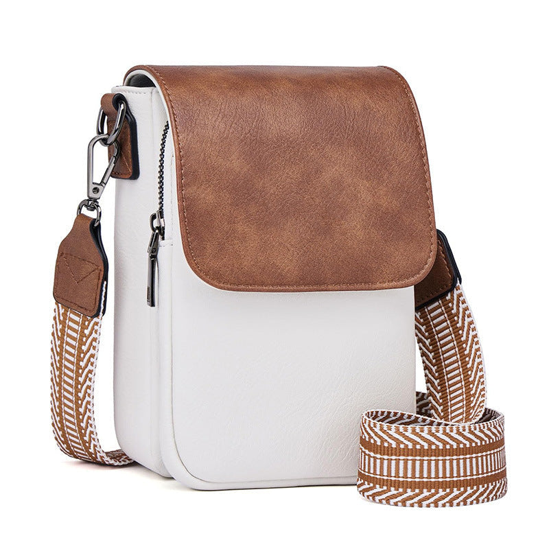 Small crossbody bag with decorative shoulder strap 
Maetiva