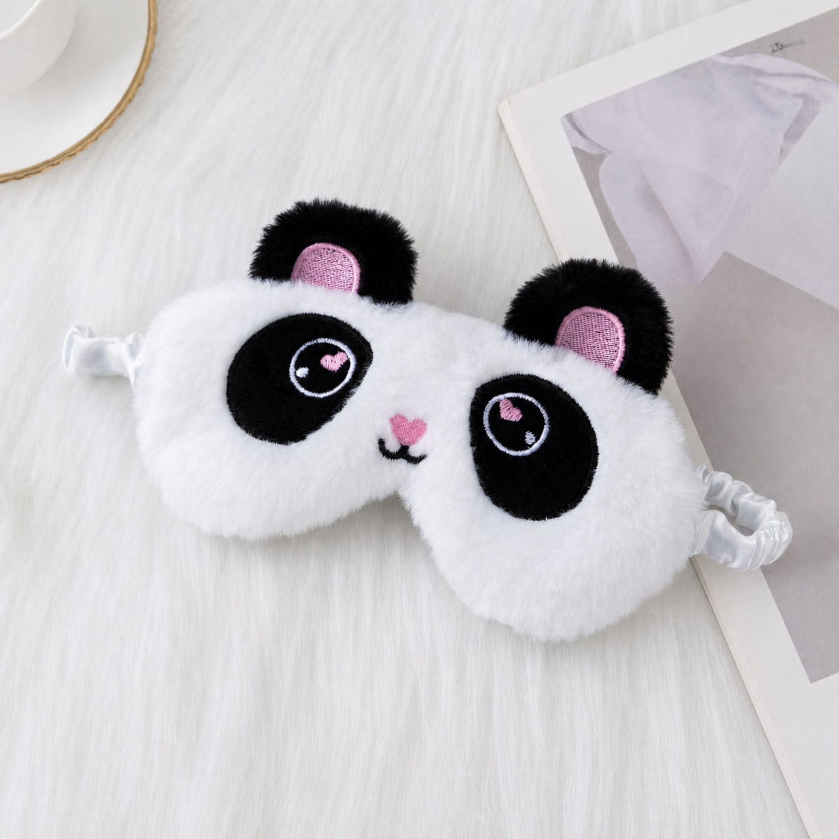 Ladies nan cozy unicorn sleep mask with embroidered eyelashes, soft plush and elastic ruffled ribbon 
Maetiva