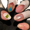 Creative Nail Art with Colorful and Playful Design 
Maetiva