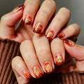 Autumn-Themed Gel Nail Art 
Maetiva