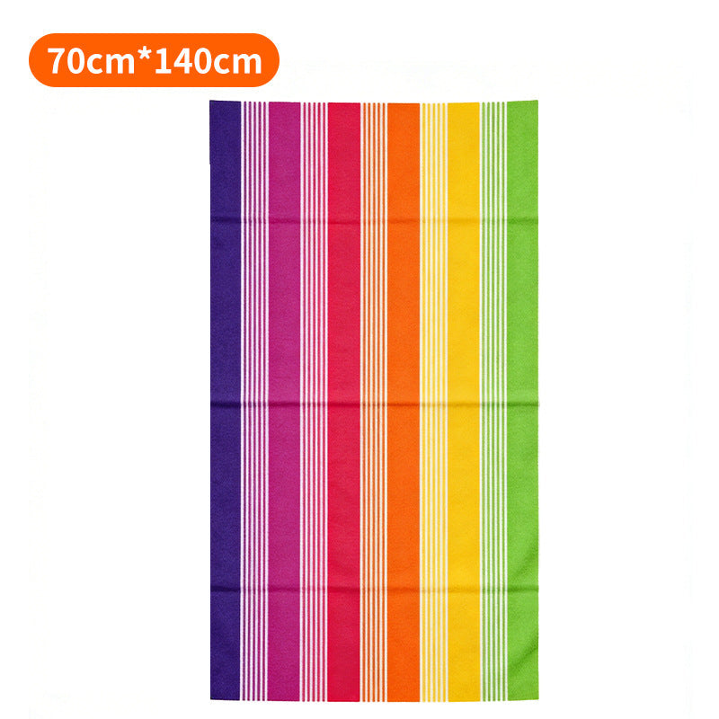 Beach towel with colorful stripe pattern 
Maetiva