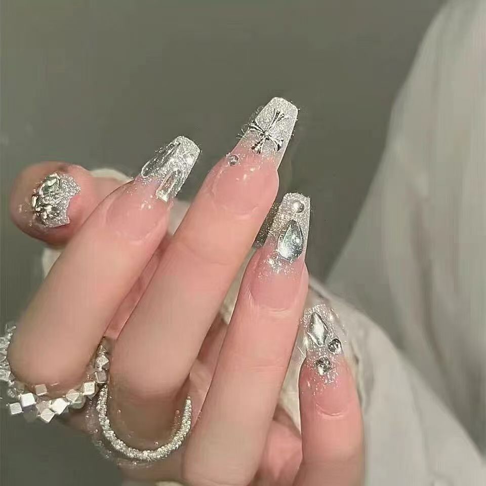 Ombre Stiletto Press-On Nail Art with Gem Accents 
Maetiva