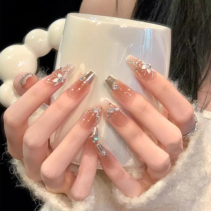 Ombre Stiletto Press-On Nail Art with Gem Accents 
Maetiva