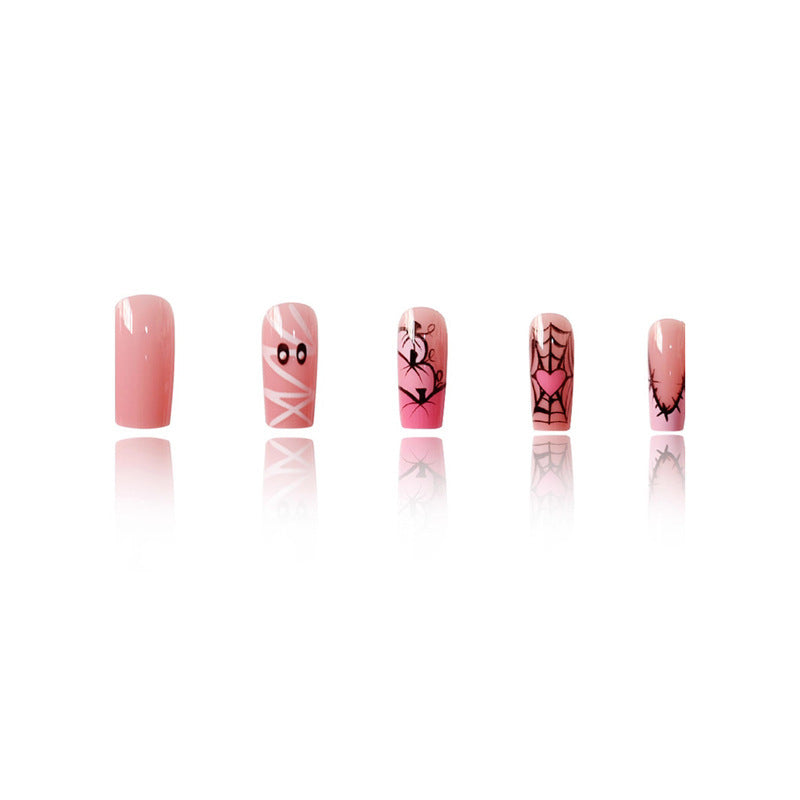 Thematic Halloween-Inspired Press-On Nail Art Extensions 
Maetiva