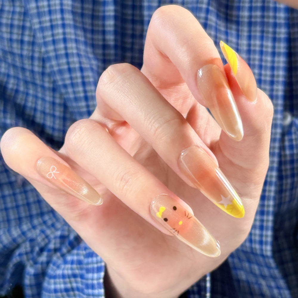 Ombre Stiletto Press-On Nail Art with Gem Accents 
Maetiva