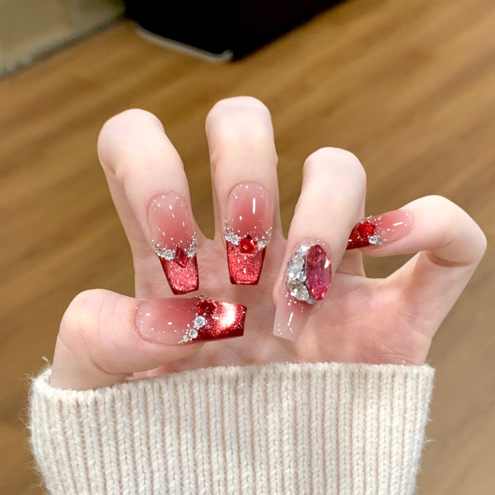 Ombre Stiletto Press-On Nail Art with Gem Accents 
Maetiva