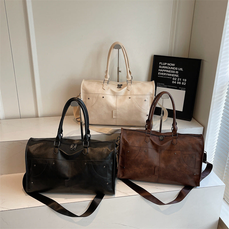 Elegant and Spacious Travel Bag Made of Durable Faux Leather 
Maetiva