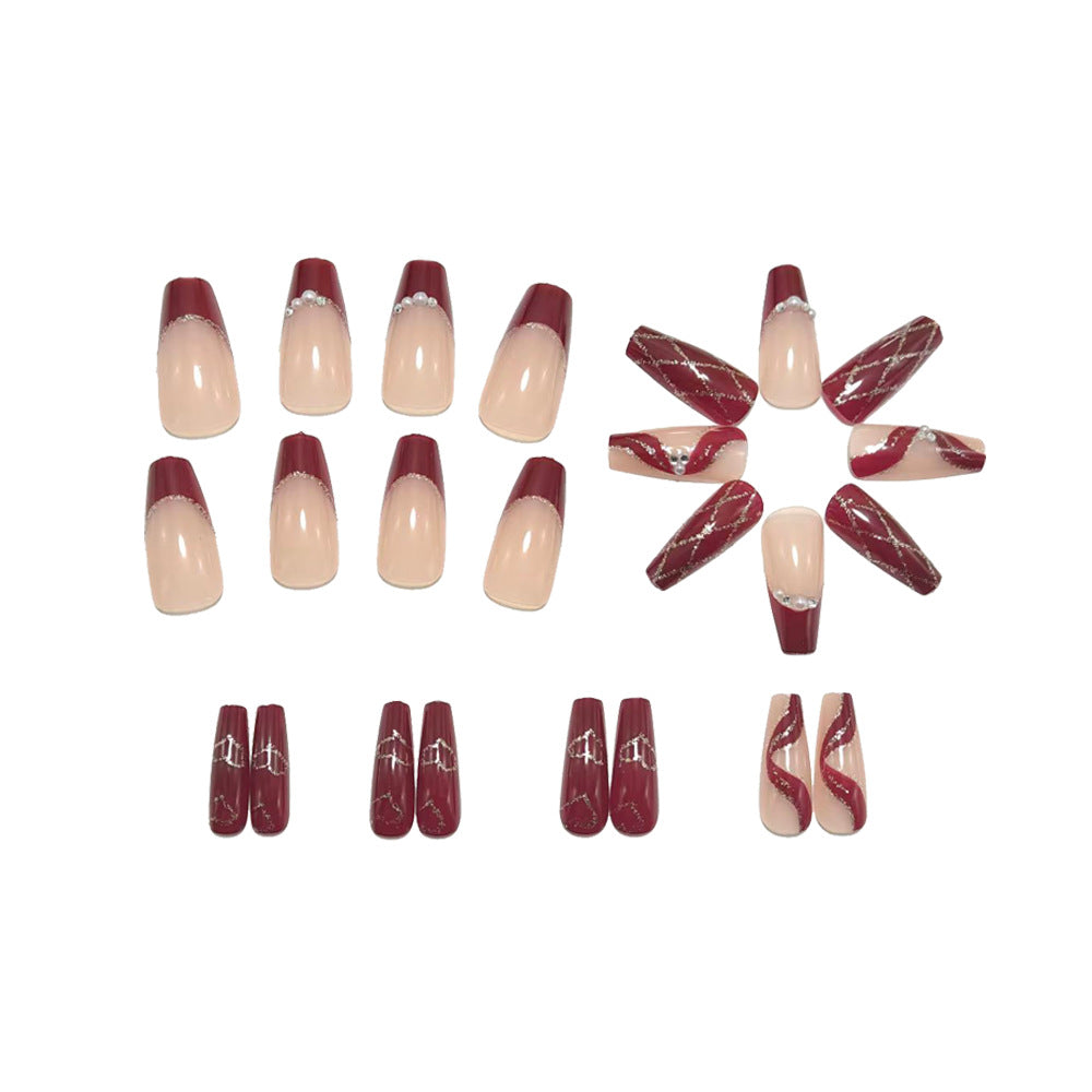 Artificial nails with elegant pearl and glitter decorations 
Maetiva