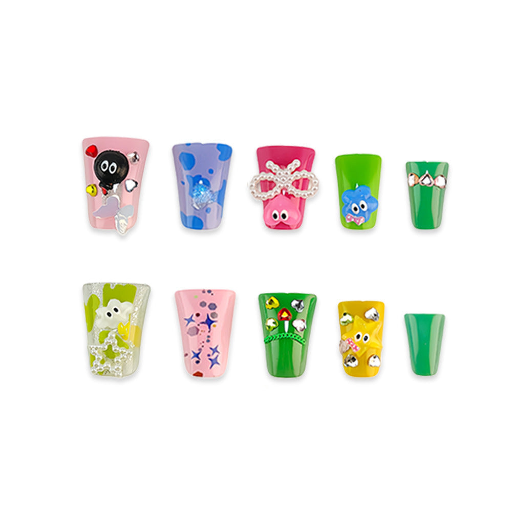 Creative press-on nails with playful 3D designs 
Maetiva