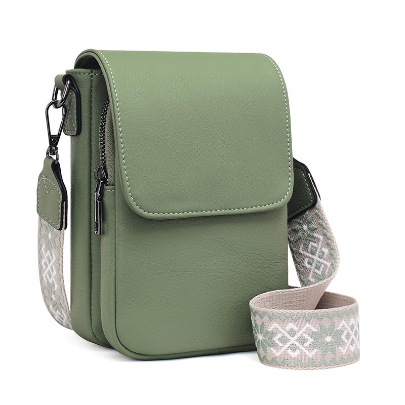 Small crossbody bag with decorative shoulder strap 
Maetiva