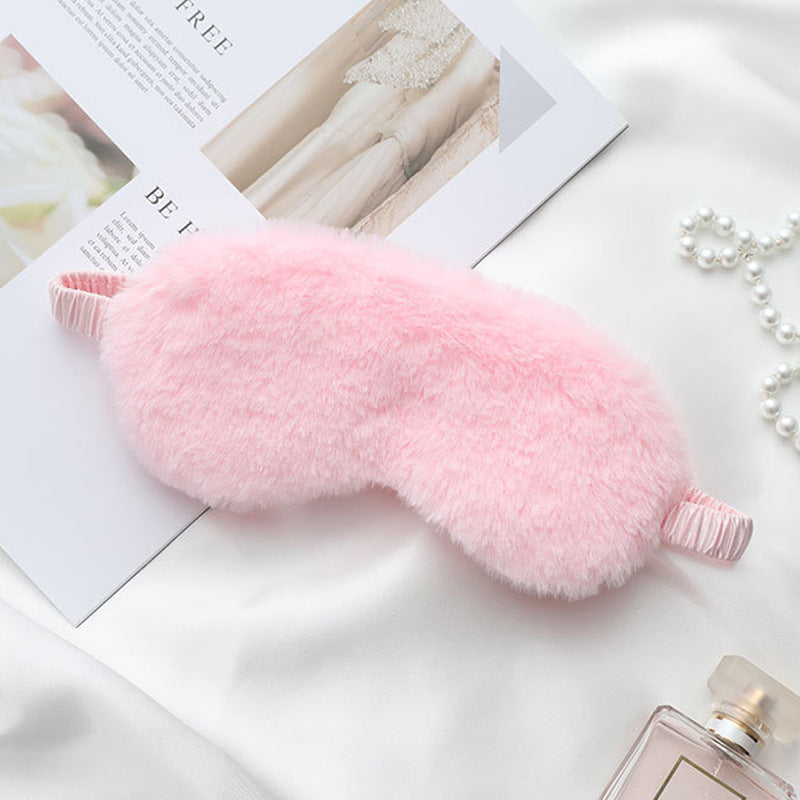 Women's fluffy ergonomic eye mask with adjustable satin band and soft faux fur cover 
Maetiva