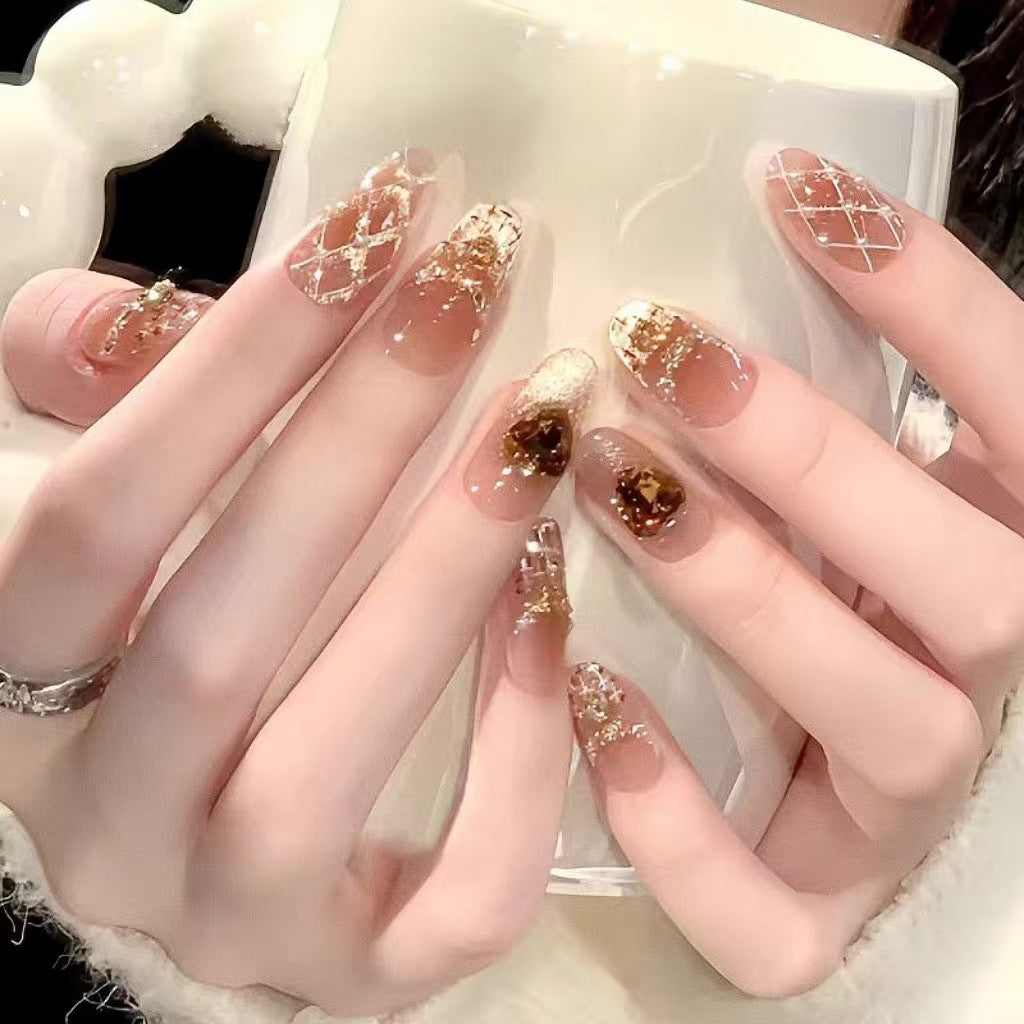 Ombre Stiletto Press-On Nail Art with Gem Accents 
Maetiva