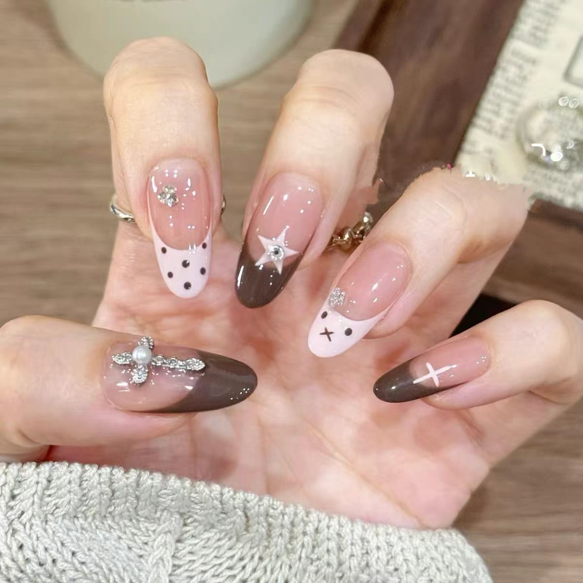 Ombre Stiletto Press-On Nail Art with Gem Accents 
Maetiva
