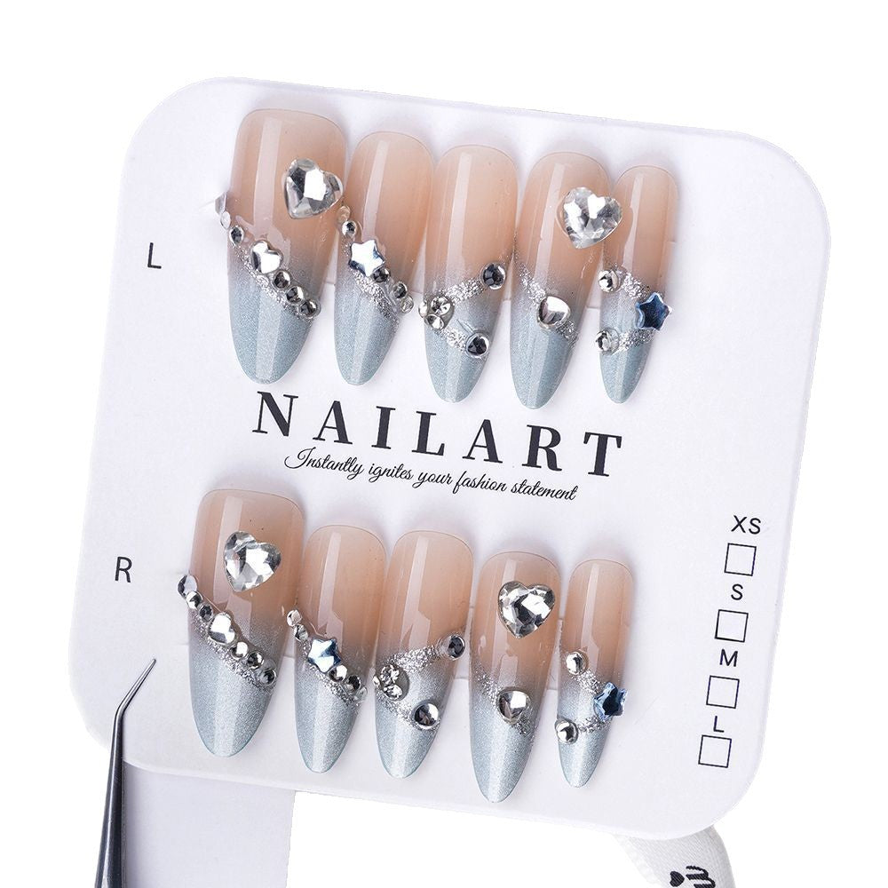Ombre Stiletto Press-On Nail Art with Gem Accents 
Maetiva