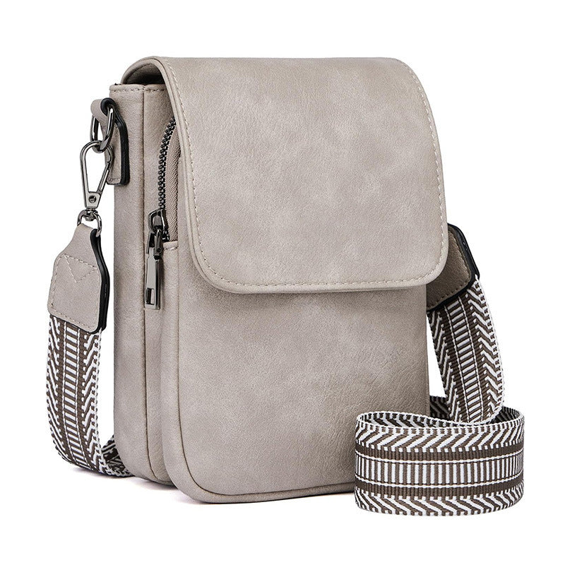 Small crossbody bag with decorative shoulder strap 
Maetiva